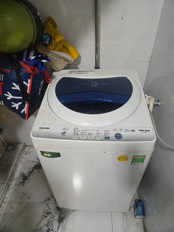 Sau khi hoàn thành sửa máy giặt cửa trên Toshiba tại Phường Bình Hưng Hòa A, Bình Tân — thợ Lê Hữu Lộc