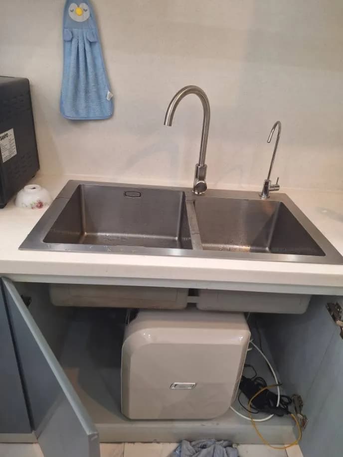 Sau khi hoàn thành sửa bồn rửa chén, máy lọc nước, vòi nước SANYO tại Quận 7 — thợ Trần Quốc Đông