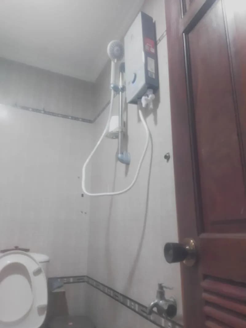 Sau khi hoàn thành sửa máy nước nóng trực tiếp Ariston tại Bình Thạnh — thợ Lê Đăng Tuấn