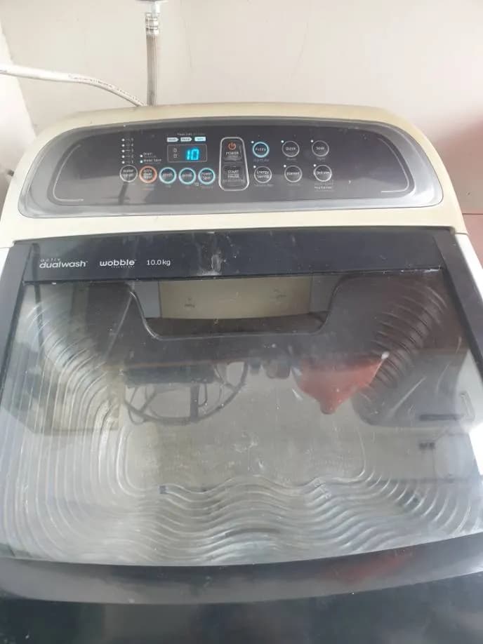 Sau khi hoàn thành sửa máy giặt cửa trên Samsung tại TPHCM — thợ Phan Chí Tâm
