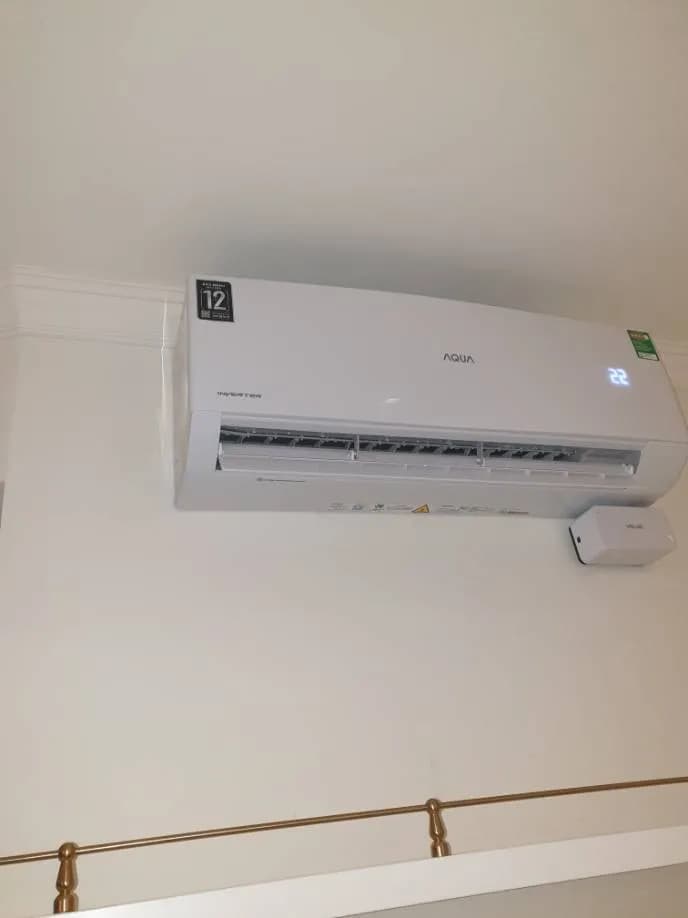 Sau khi hoàn thành sửa máy lạnh treo tường AQUA tại Bình Tân — thợ Phan Chí Tâm