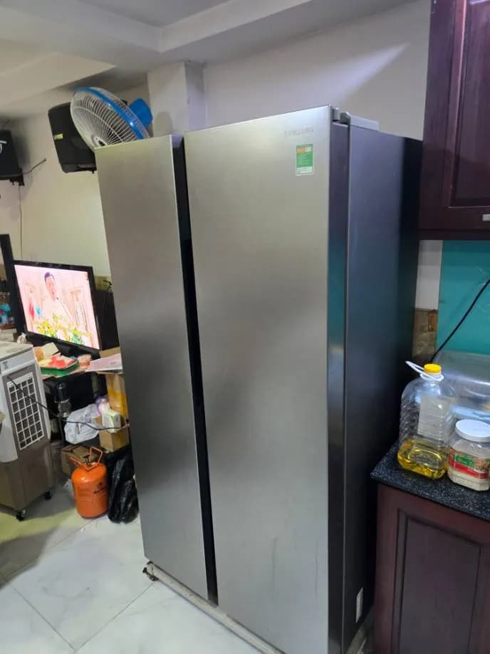 Sau khi hoàn thành sửa tủ lạnh side-by-side Samsung tại Tân Phú — thợ Lê Hữu Lộc