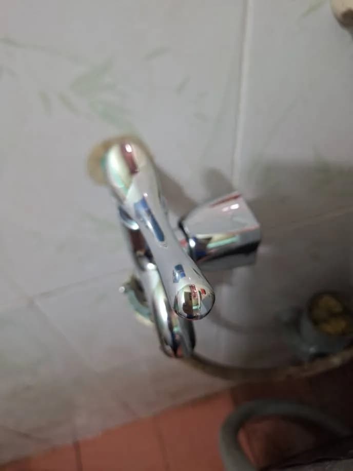 Sau khi hoàn thành sửa vòi nước tại phường Tân Mỹ, Quận 7 — thợ Trần Quốc Đông (5 sao)