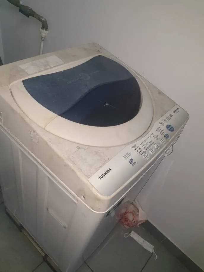 Trước sửa máy giặt cửa trên Toshiba tại phường Tân Phong Quận 7, Quận 7 — thợ Phan Chí Tâm