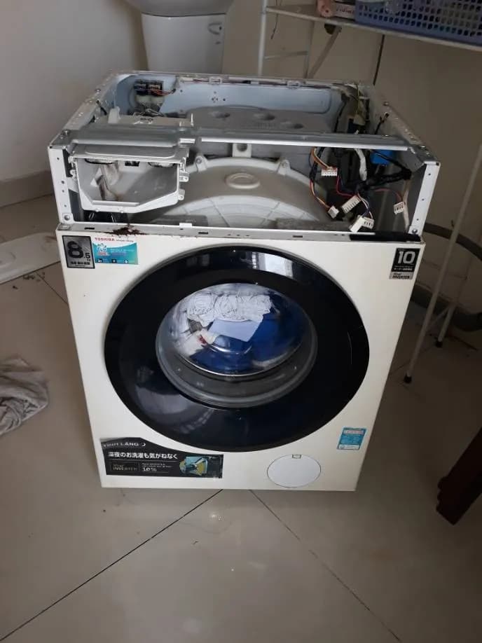 Trước sửa máy giặt cửa trước Toshiba tại Phường Tân Hưng, Quận 7 — thợ Đặng Anh Huy