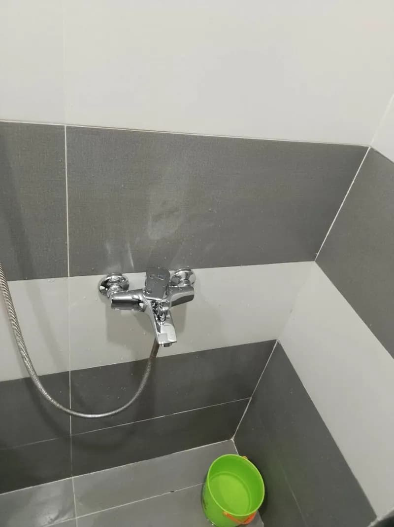 Sau khi hoàn thành sửa vòi sen tắm tại Tân Phú — thợ Trương Công Việt Trân