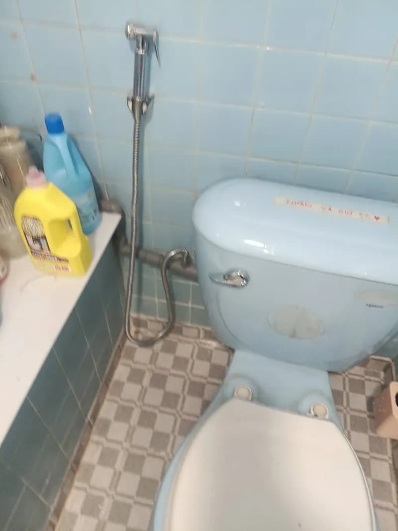 Thay bộ xả bồn cầu hai nhấn tại Quận 1 trọn gói tại Quận 1