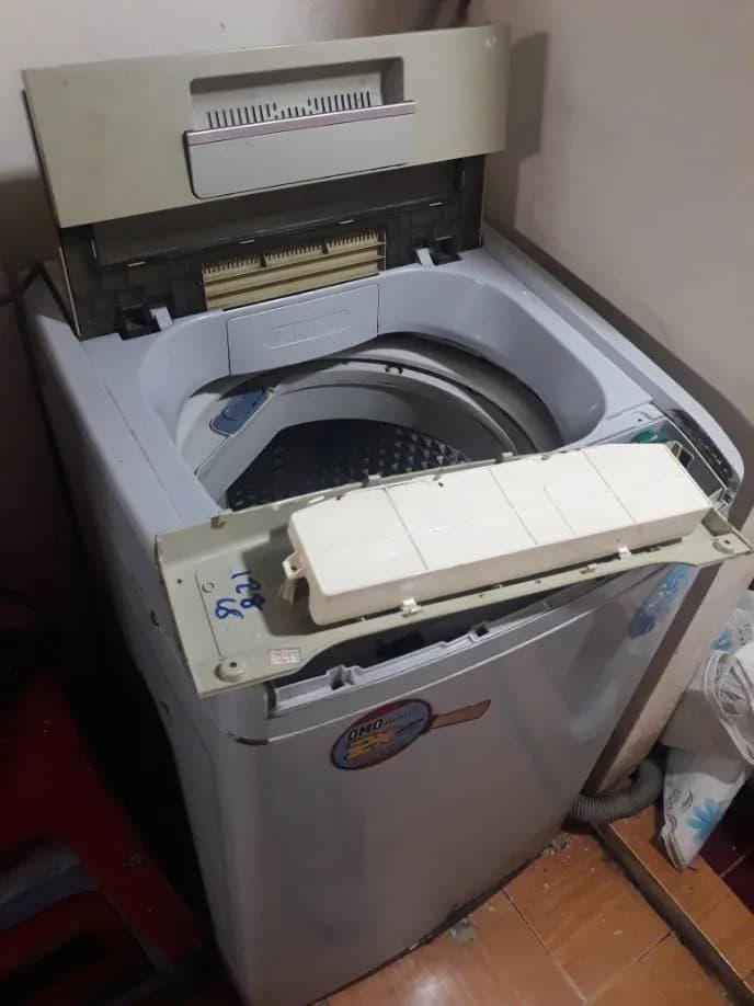 Trước sửa máy giặt cửa trên tại phường Khánh Hội ( Q4 cũ ), Quận 4 — thợ Đặng Anh Huy