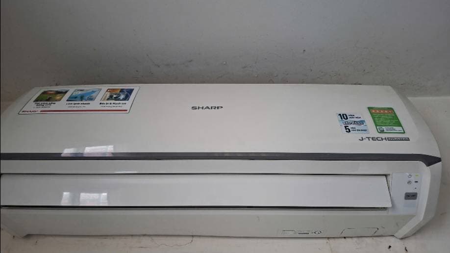 Sau khi hoàn thành sửa máy lạnh treo tường Sharp tại Tân Bình — thợ Lê Hữu Lộc