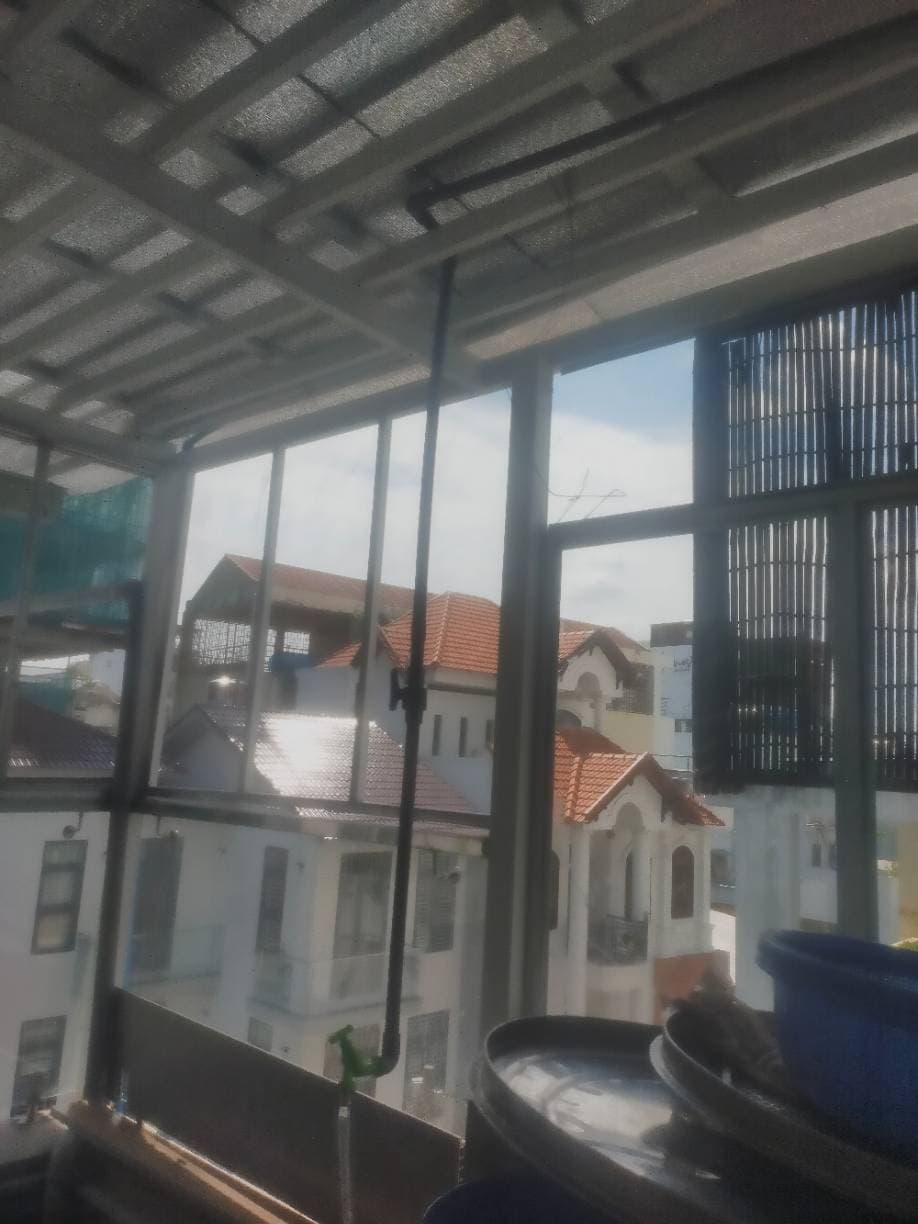 Sau khi hoàn thành sửa đèn và quạt hút tại TPHCM — thợ Lê Tuấn